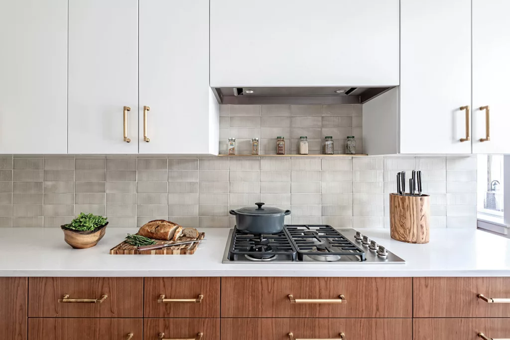 Kitchen with beautiful custom cabinets with different finishes