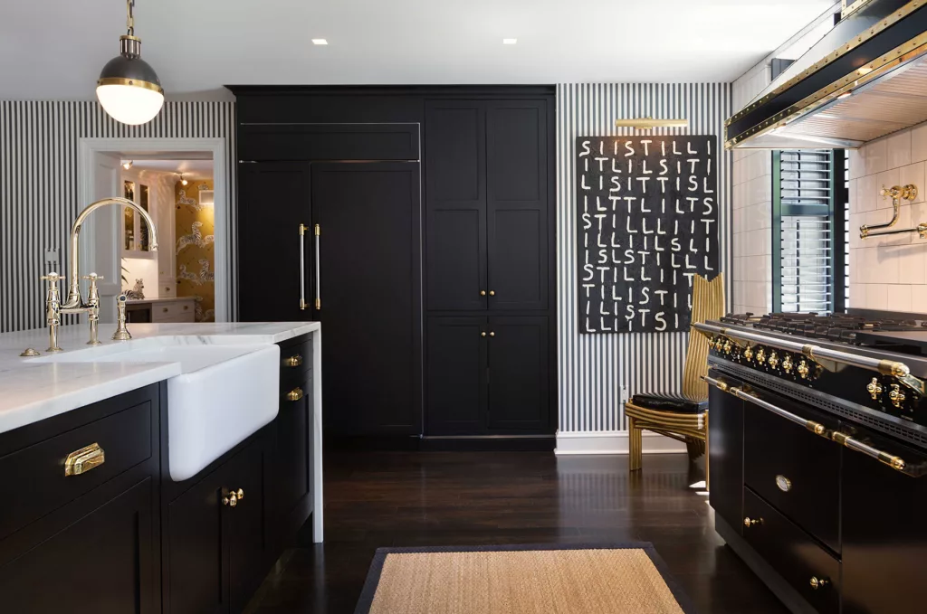 Custom kitchen with black painted cabinets