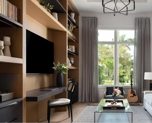 Custom office cabinets and built-in library shelves in a home study