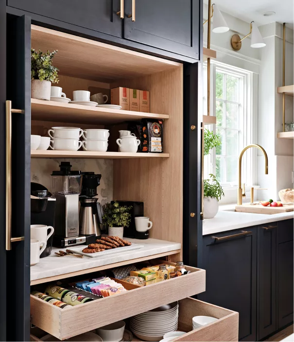 Custom built-in kitchen pantry with slide out drawers