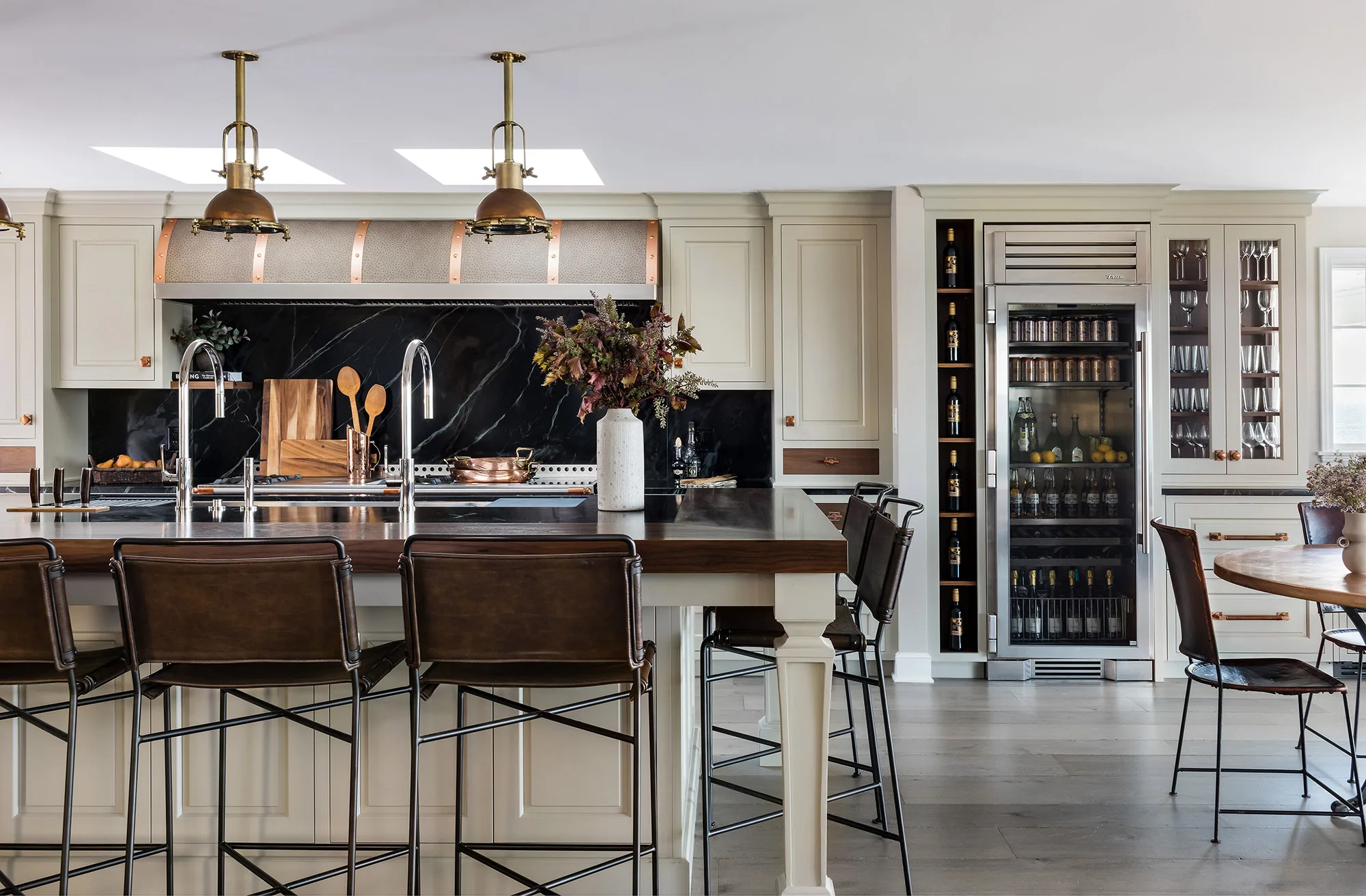 Luxury kitchen cabinetry with inset doors and handcrafted wood finish by Quality Custom Cabinetry