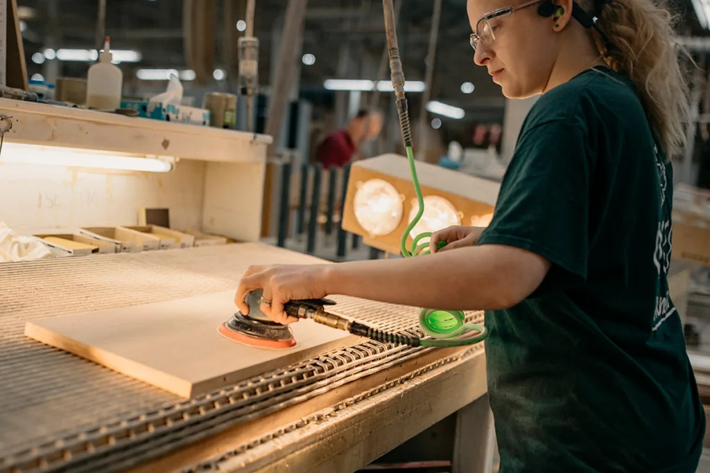 Team member working in the cabinet shop