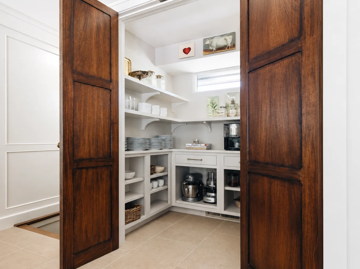 Custom-built library shelves designed for elegant and functional home libraries