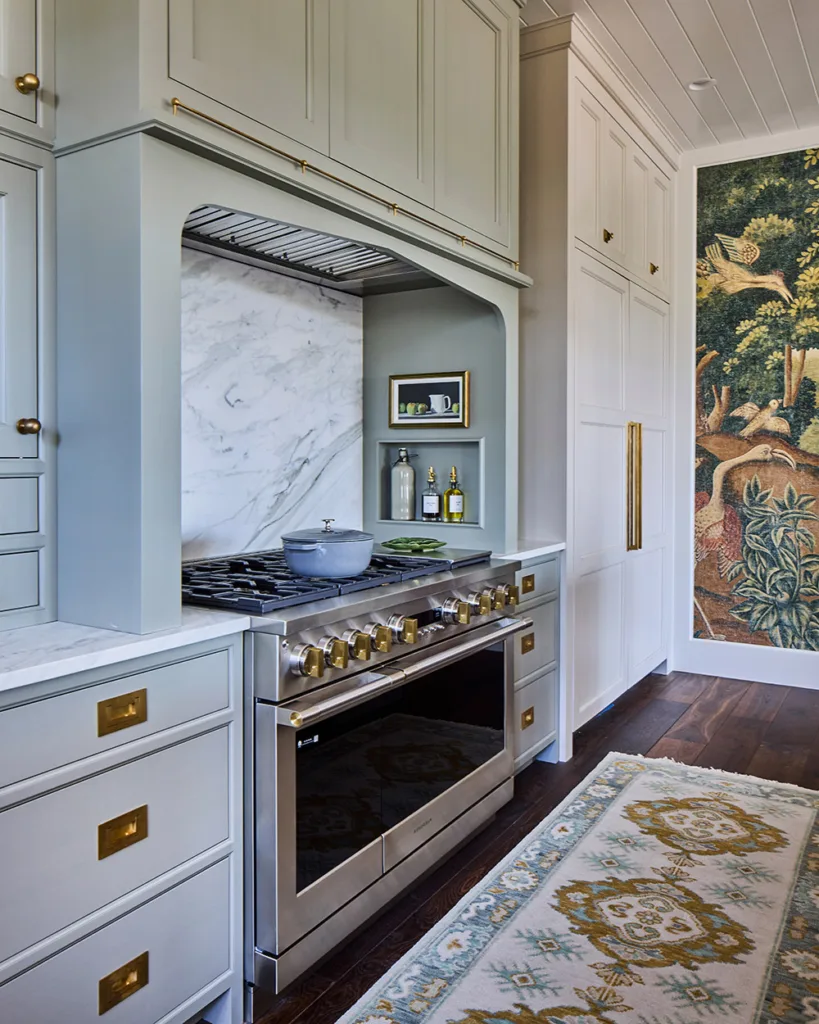 Bespoke custom cabinetry with stove and custom range hood