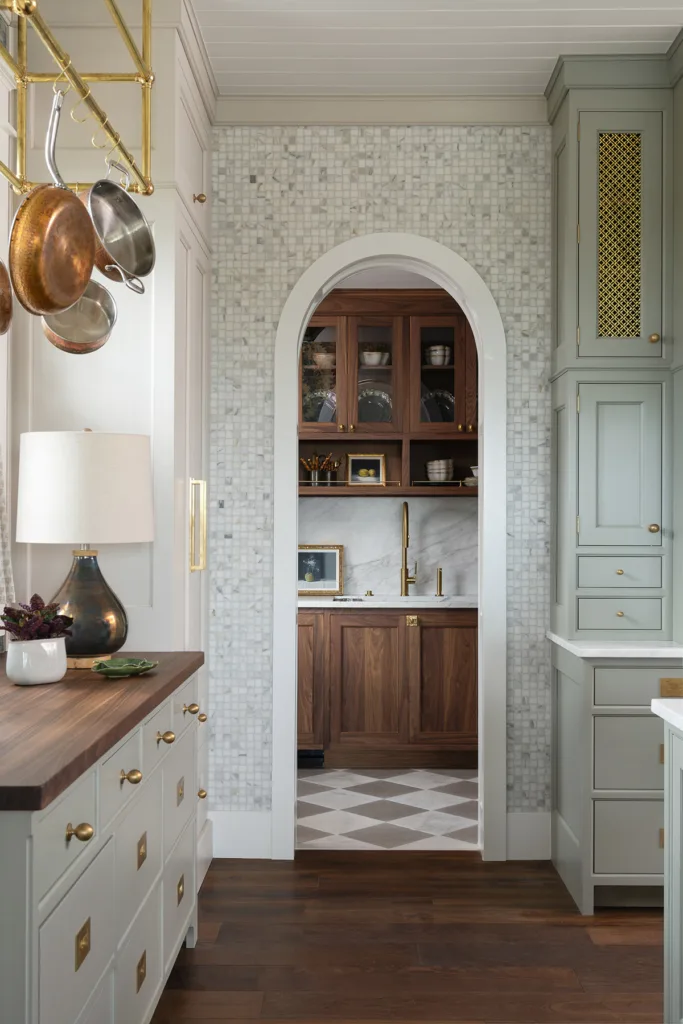 Arched doorway with Butler's pantry cabinets in view