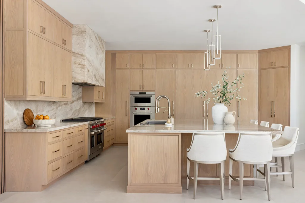 Luxury kitchen with bespoke custom cabinetry in natural finish wood